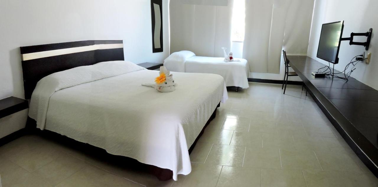 Hotel Plaza Playa Playa del Carmen Bagian luar foto
